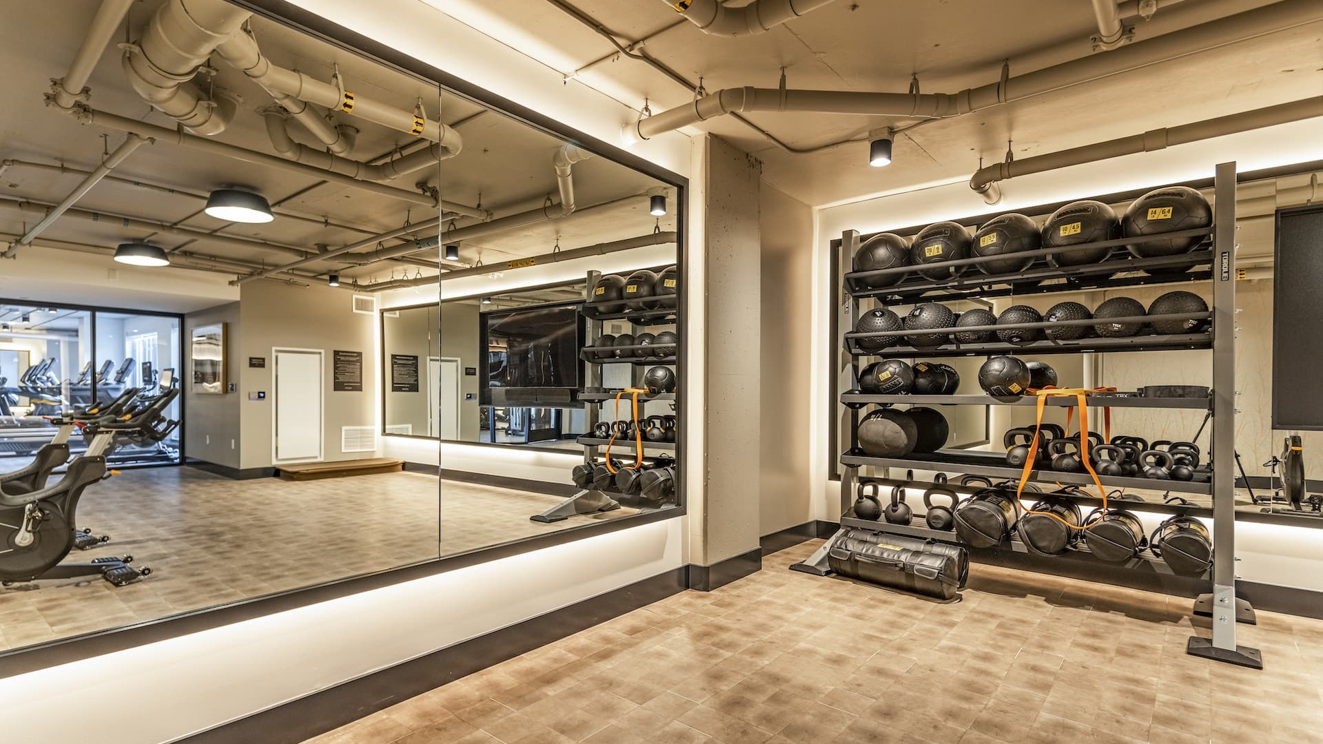 fitness center equipment with carpeted floors