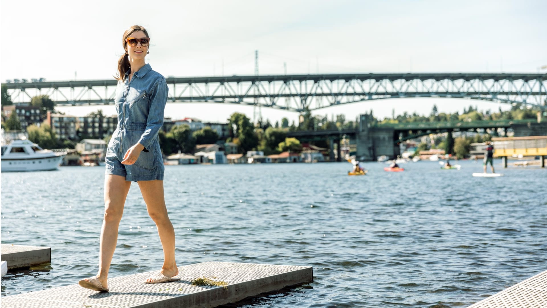 Woman relaxing in the sun near the water